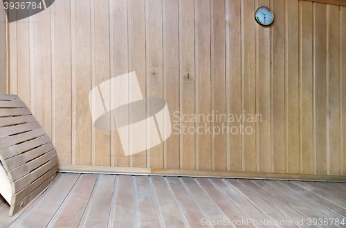 Image of A small sauna with wooden walls