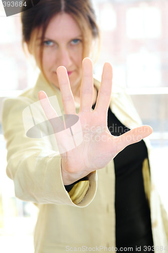 Image of Mature woman gesturing stop