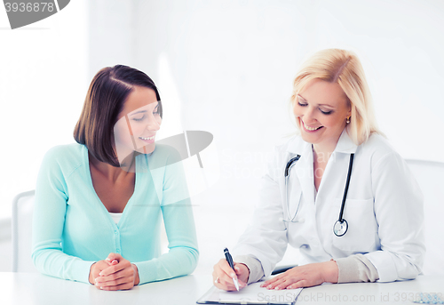 Image of doctor with patient in hospital