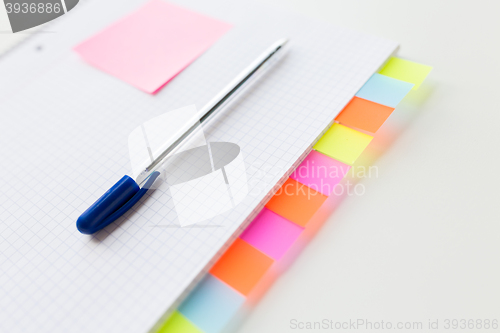 Image of close up of organizer and pen on office table