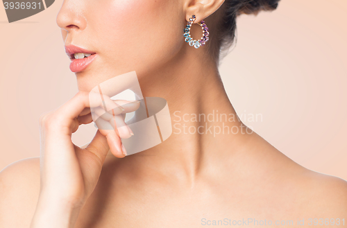 Image of close up of beautiful woman face with earring