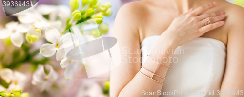 Image of close up of beautiful woman with ring and bracelet