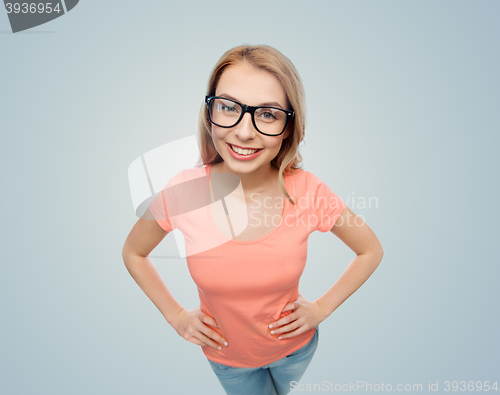 Image of happy young woman or teenage girl in eyeglasses