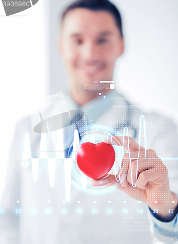 Image of male doctor with heart and cardiogram