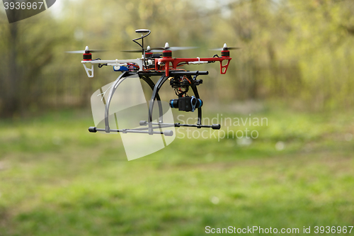 Image of Drone flying in forest