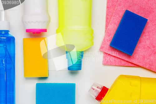 Image of House cleaning products on white table