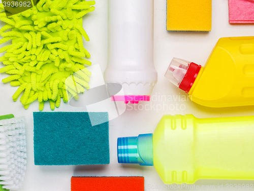 Image of House cleaning products on white table
