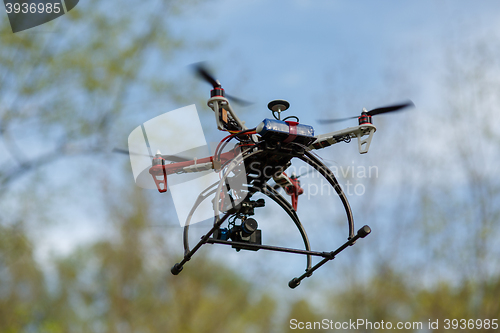 Image of Drone flying in forest