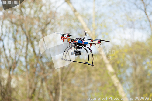 Image of Drone flying in forest