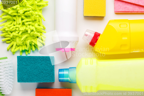 Image of House cleaning products on white table