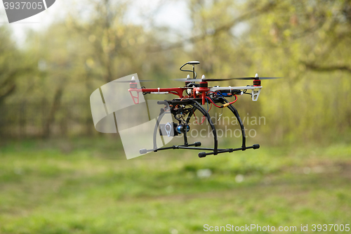 Image of Drone flying in forest