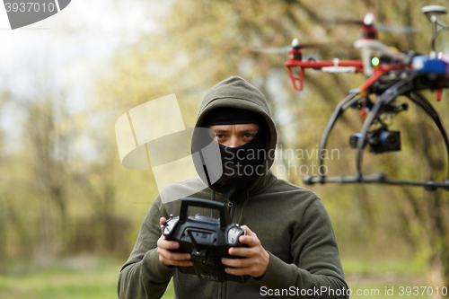 Image of Man flying with the drone