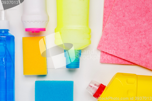 Image of House cleaning products on white table