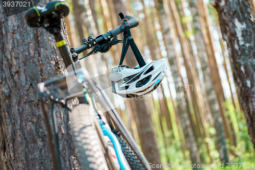 Image of cycling helmet closeup on bicycle outdoors