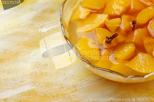 Image of Glass bowl filled by apple compote