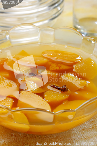 Image of Glass bowl filled by apple compote