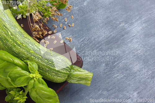 Image of Still life with courgette, basil and dill