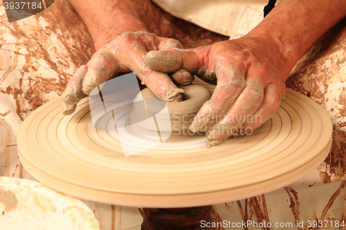 Image of Pottery making close-up.\r\n