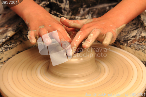 Image of Pottery making close-up.\r\n