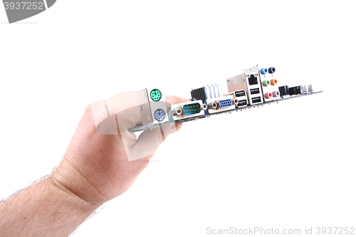 Image of motherboard in human hand
