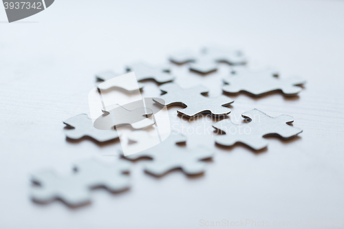 Image of close up of puzzle pieces on table