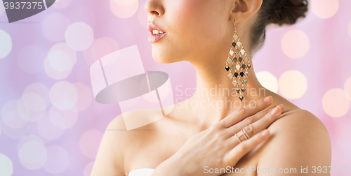 Image of close up of beautiful woman with earrings