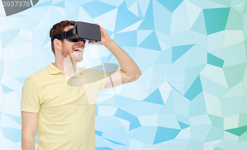 Image of happy man in virtual reality headset or 3d glasses