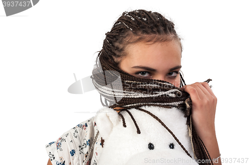 Image of Young attractive woman with african braids