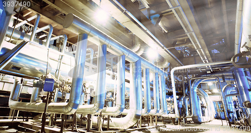 Image of Equipment, cables and piping as found inside of a modern industr