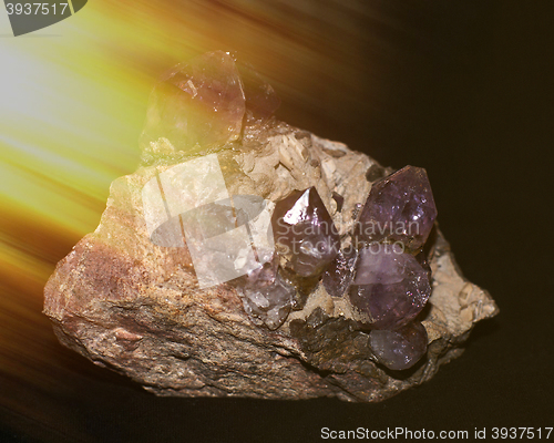 Image of natural amethyst crystallized structure on black background     