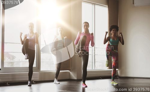 Image of group of women working out in gym