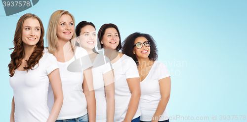 Image of group of happy different women in white t-shirts