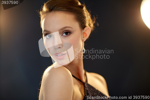 Image of beautiful young asian woman with diamond earring