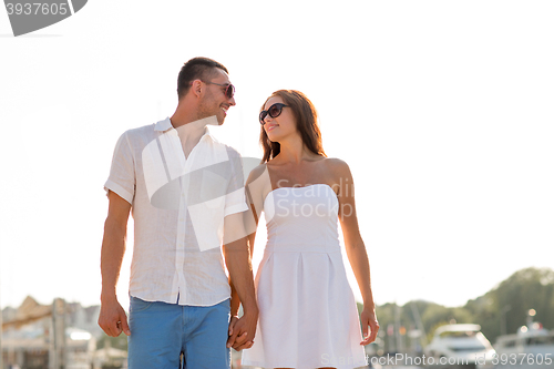 Image of smiling couple in city