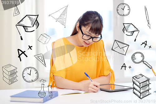 Image of asian woman student with tablet pc at home