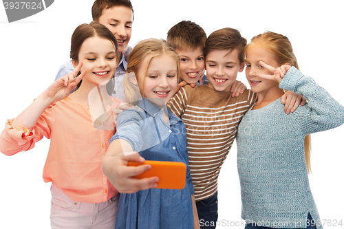 Image of happy children talking selfie by smartphone