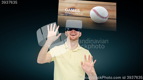 Image of happy man in virtual reality headset or 3d glasses