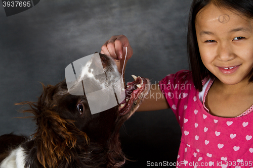 Image of Child and dog