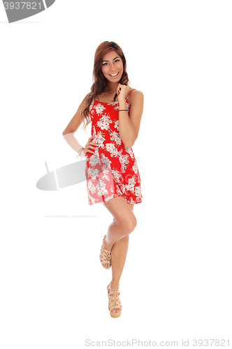 Image of Happy young woman in red dress.