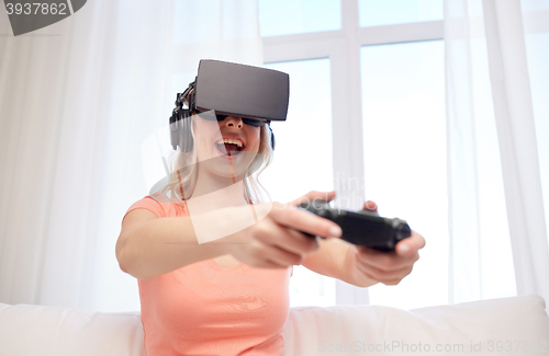 Image of woman in virtual reality headset with controller