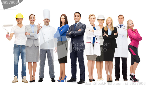 Image of businessman over different professional workers