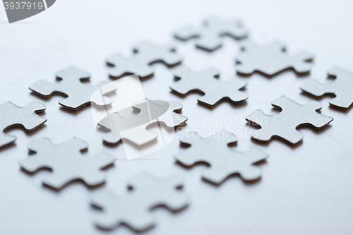 Image of close up of puzzle pieces on table