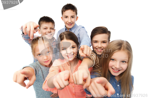 Image of happy children pointing finger to you