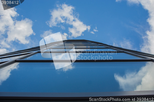 Image of window reflection dayligh as blue background