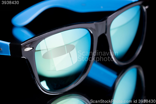 Image of colored sunglasses.