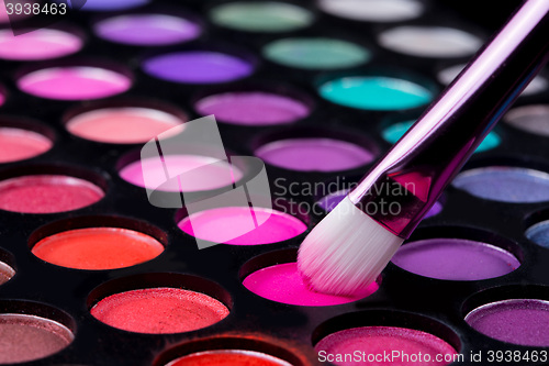 Image of brushes and make-up eye shadows