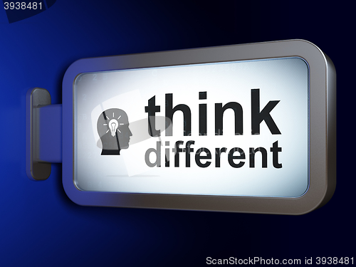 Image of Studying concept: Think Different and Head With Light Bulb on billboard background