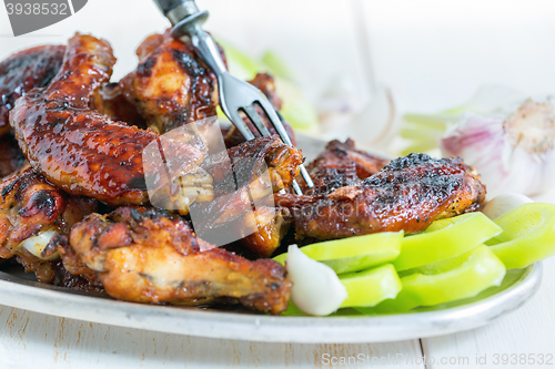 Image of Fried chicken wings closeup.