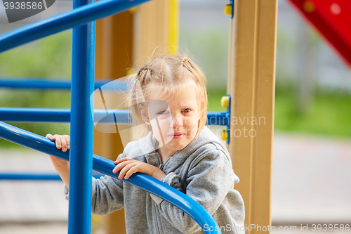 Image of Beautiful sad little girl crying