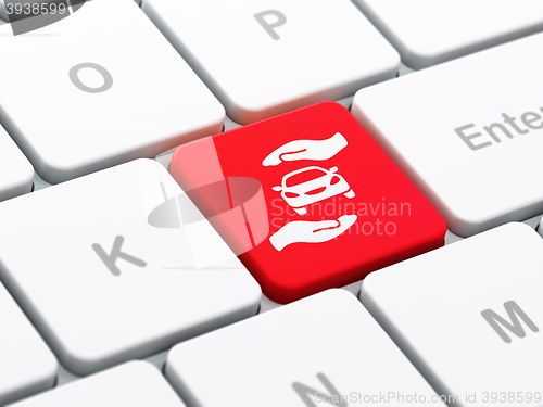 Image of Insurance concept: Car And Palm on computer keyboard background